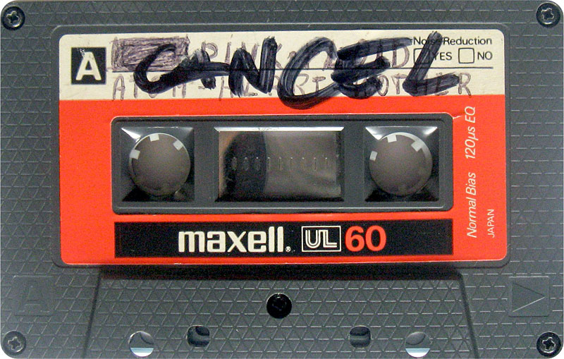 A cassette tape has written CANCEL in big, fat marker on it.