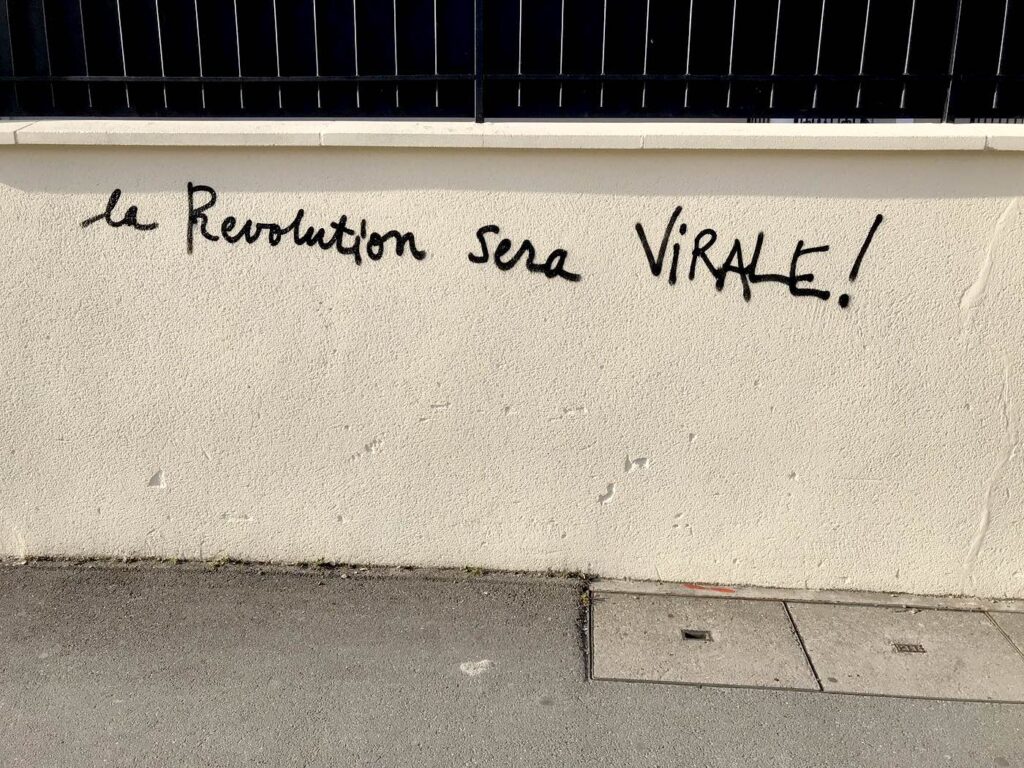 A graffiti reads La revolution sera virale