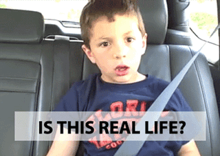 A kid sits on the backseat of a car and asks "is this real life?"